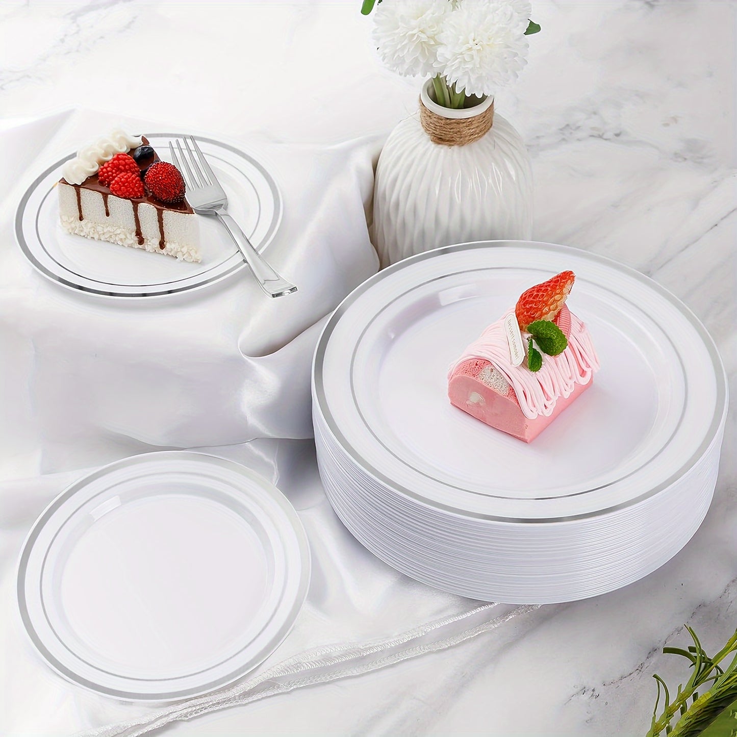 A Set Of Silvery Disposable Tableware For Weddings And Parties