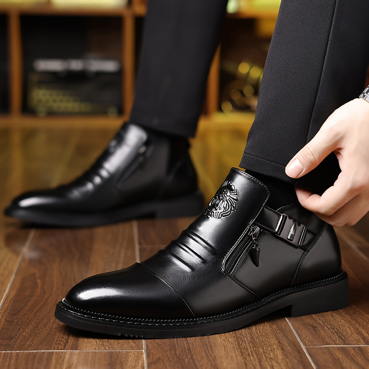 Men's Elegant Black Ankle Boots with Embossed Lion Design